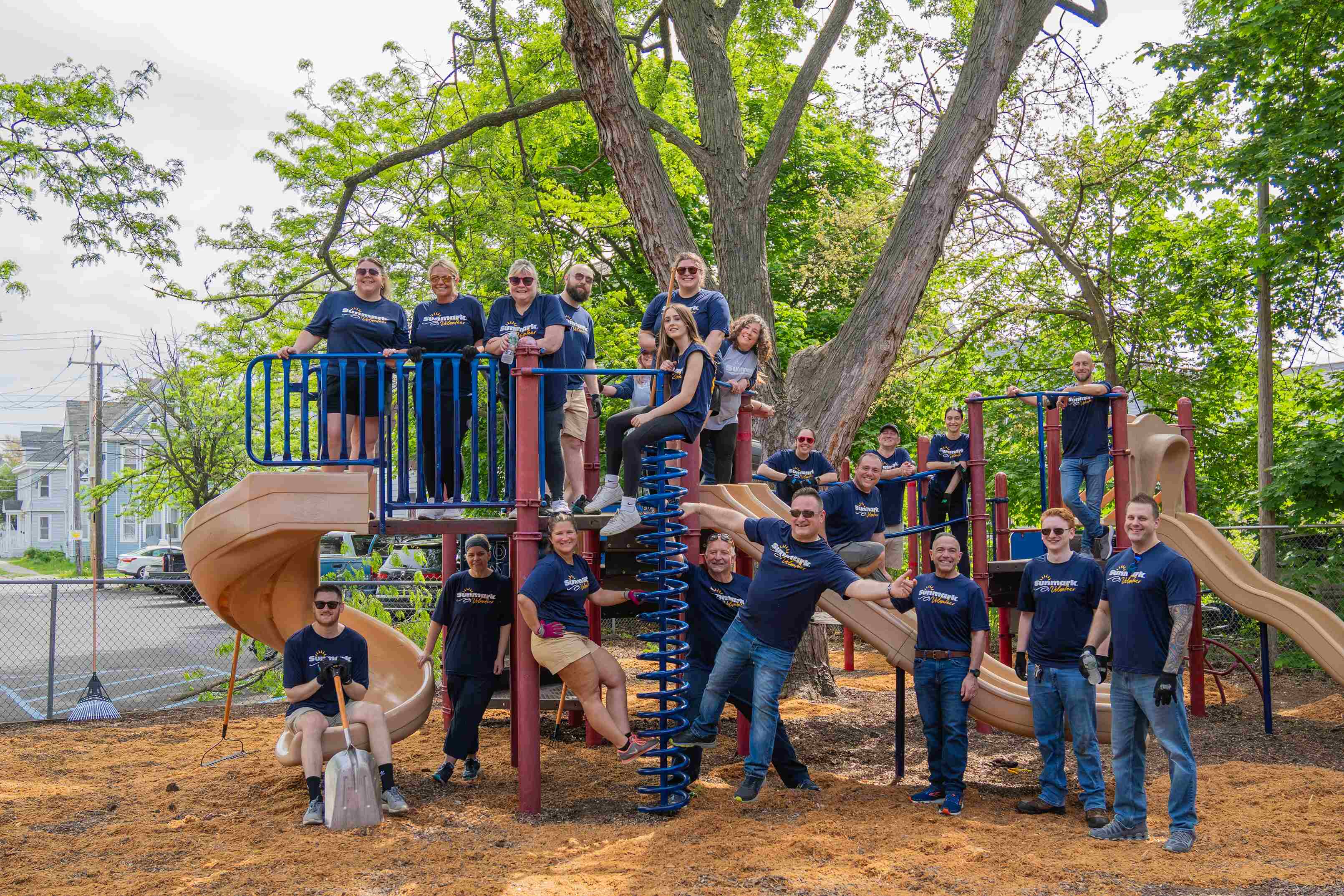 Volunteers cleaning up a playground